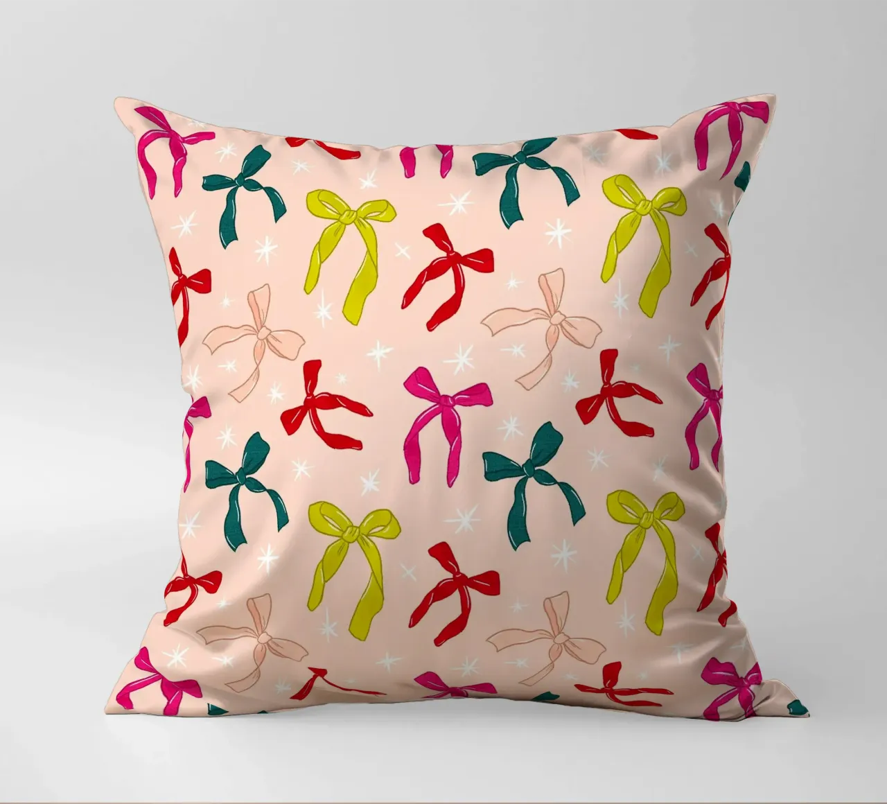 Colorful Bows Pattern on Soft Peach Background cuscino da showmemars