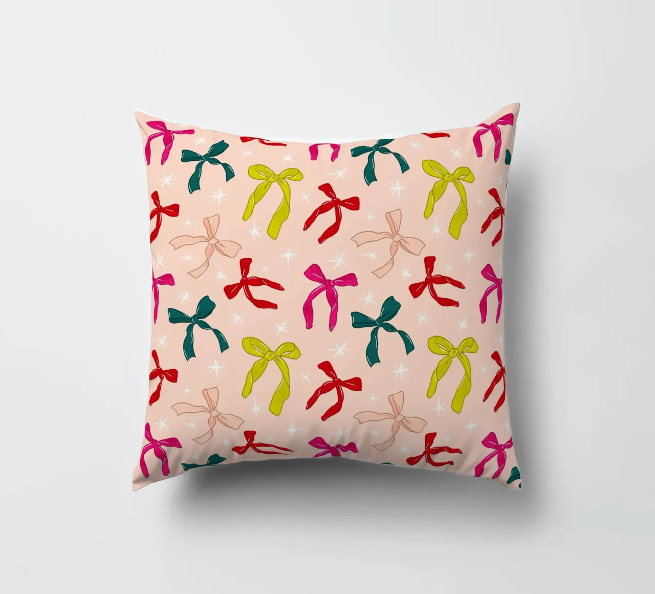 Colorful Bows Pattern on Soft Peach Background cuscino da showmemars