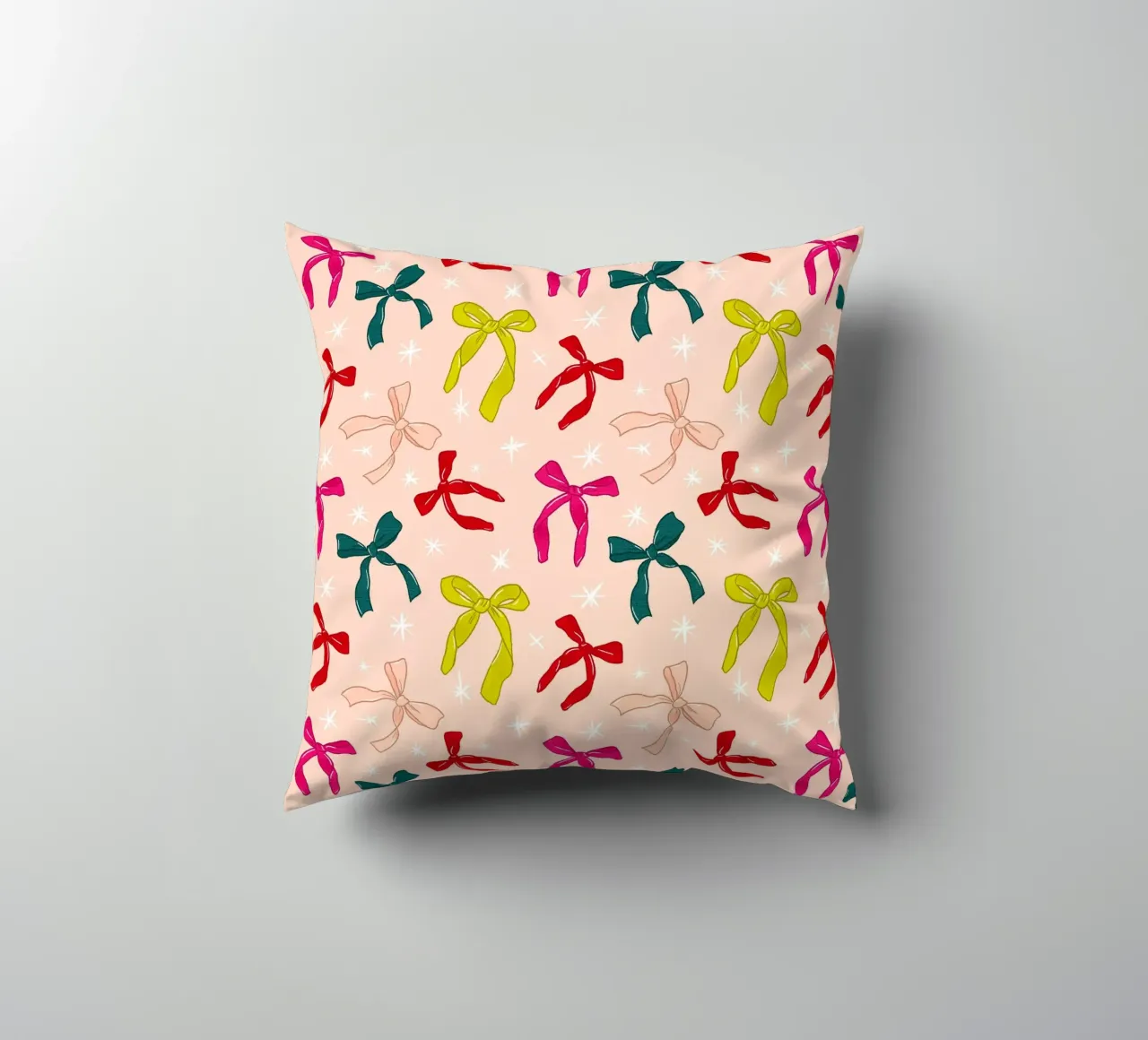 Colorful Bows Pattern on Soft Peach Background cuscino da showmemars