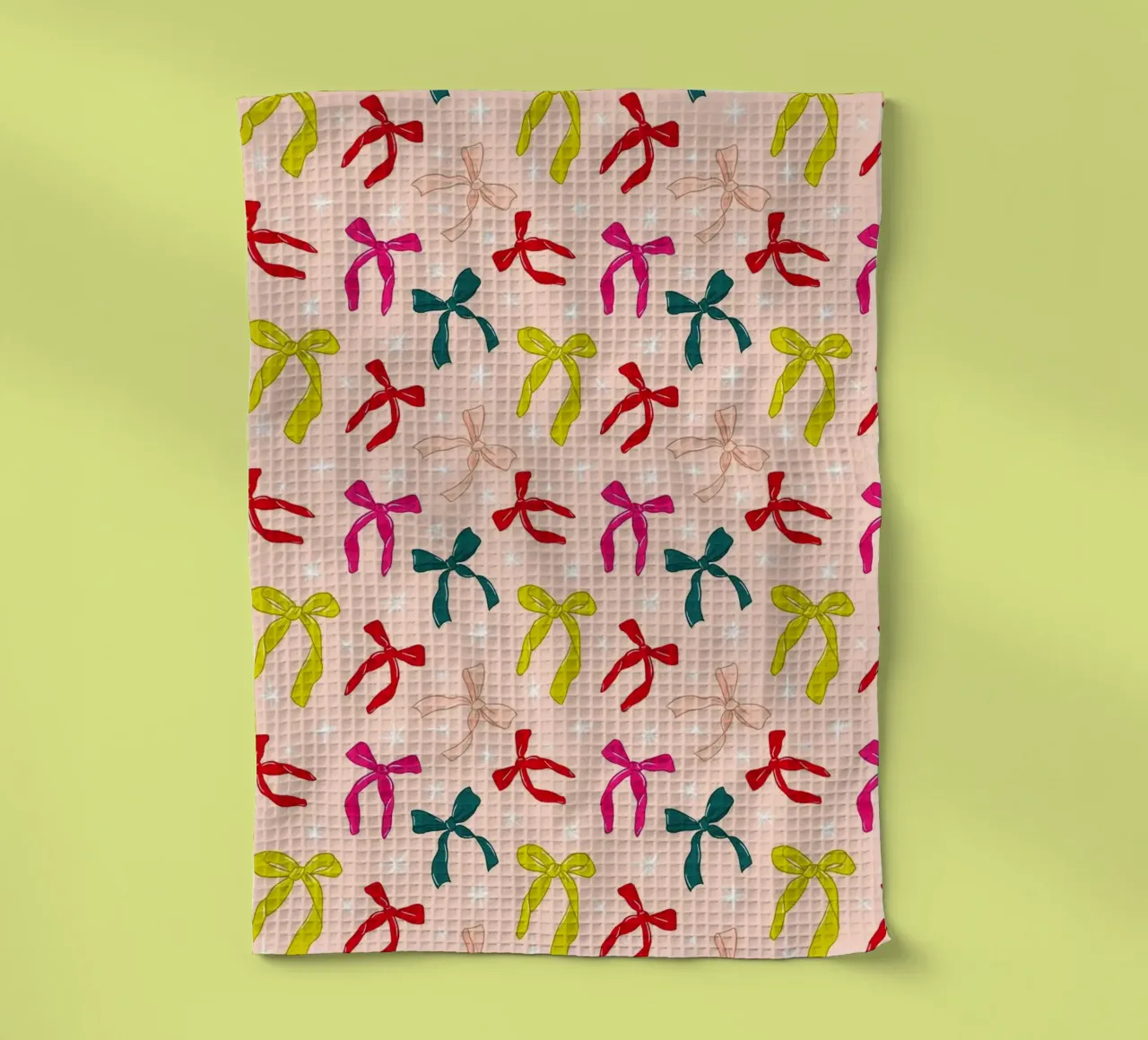 Colorful Bows Pattern on Soft Peach Background torchon de showmemars