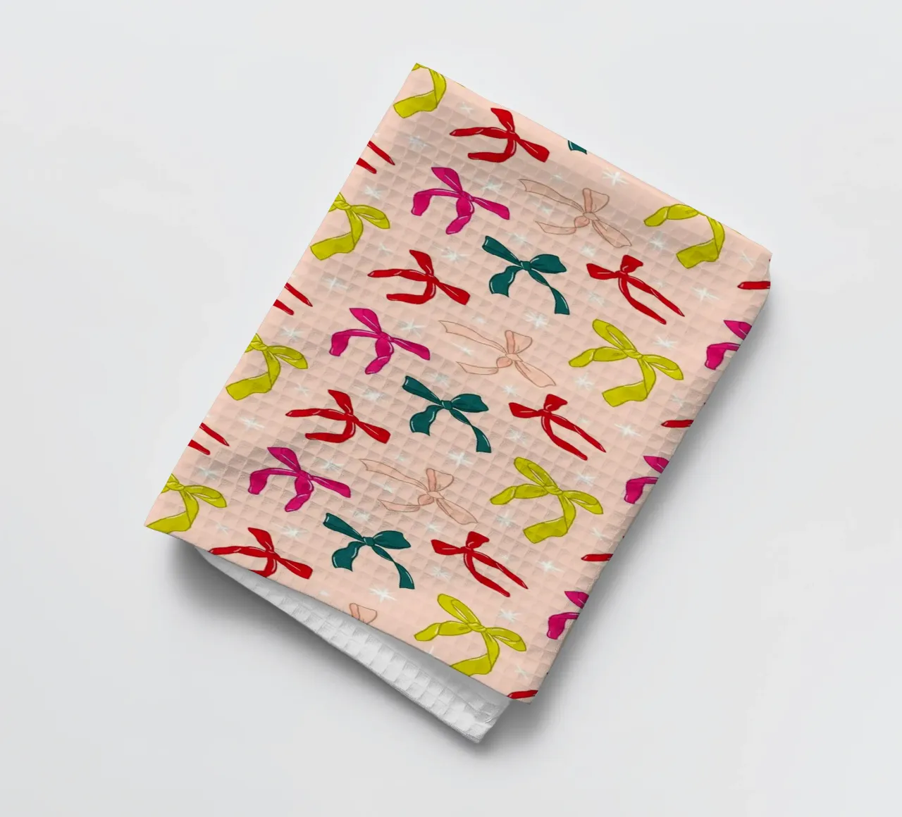 Colorful Bows Pattern on Soft Peach Background torchon de showmemars