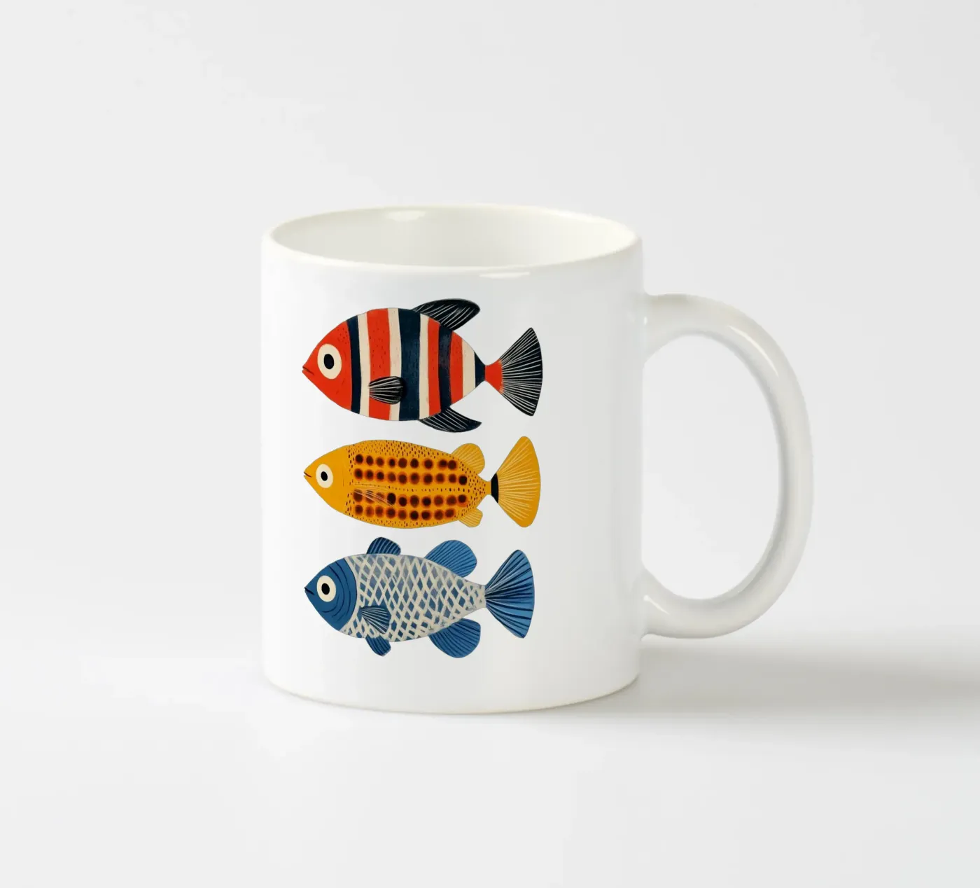 Three fish ceramic mug by Curious Canvas