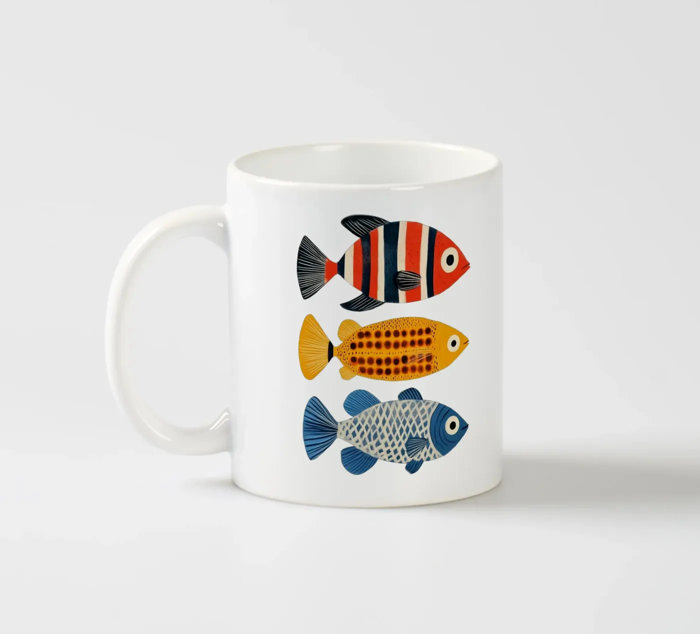 Three fish ceramic mug by Curious Canvas