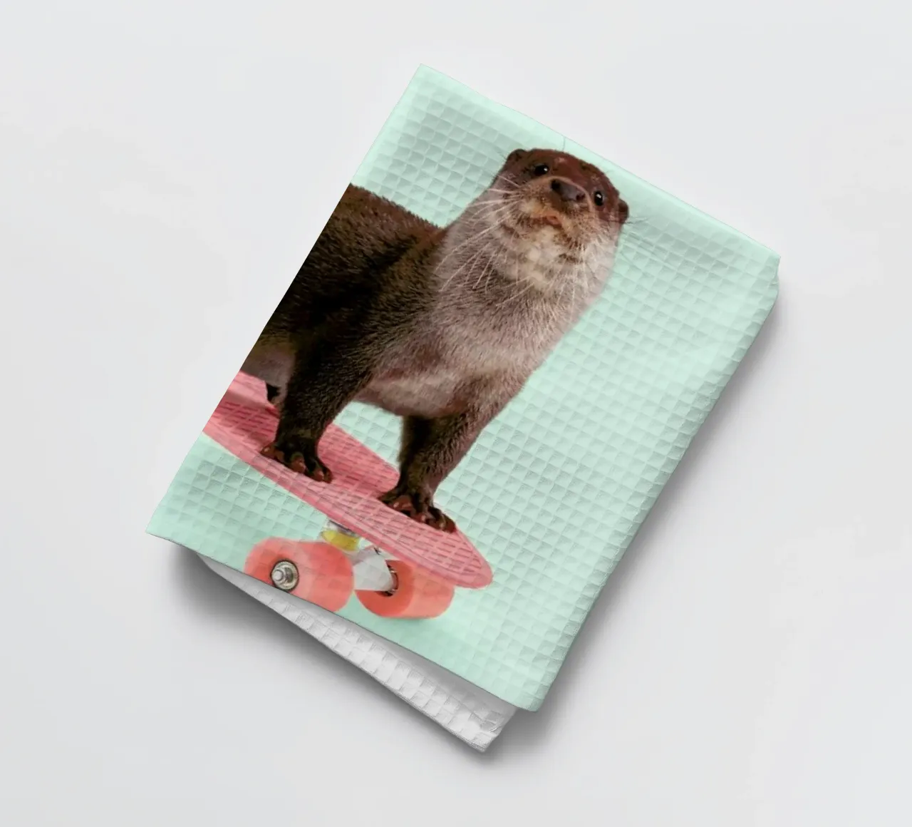 Skate Otter tea towel by Paul Fuentes Design