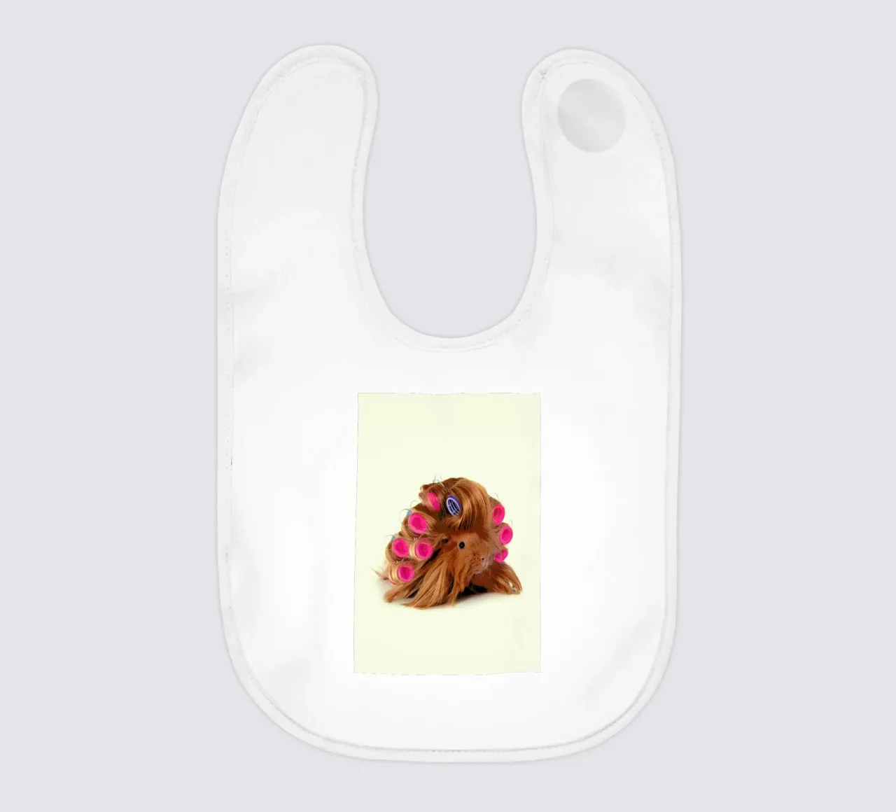 Curly Guineapig bavaglino da Paul Fuentes Design