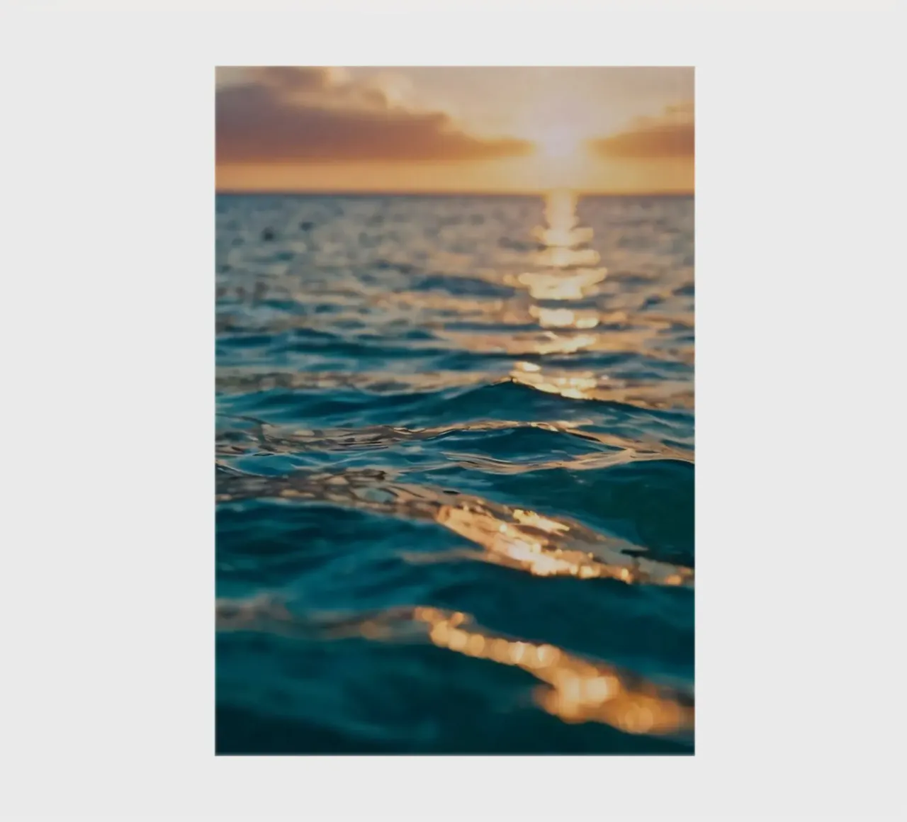 calm ocean waves reflect a vibrant sunset over calm wate notebook by DesignDoodle