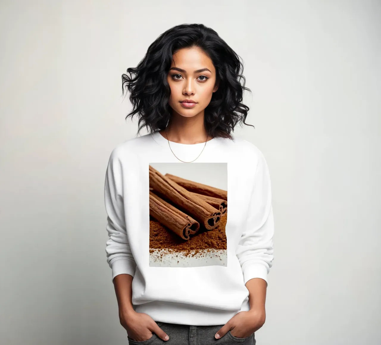 Kaneelstokjes en poeder netjes gerangschikt op wit oppervlak sweatshirt van DesignDoodle