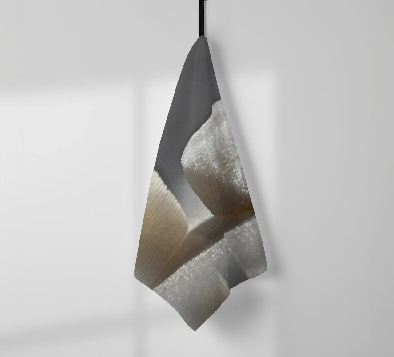 Two sugar cubes on a reflective surface with soft lighting tea towel by DesignDoodle
