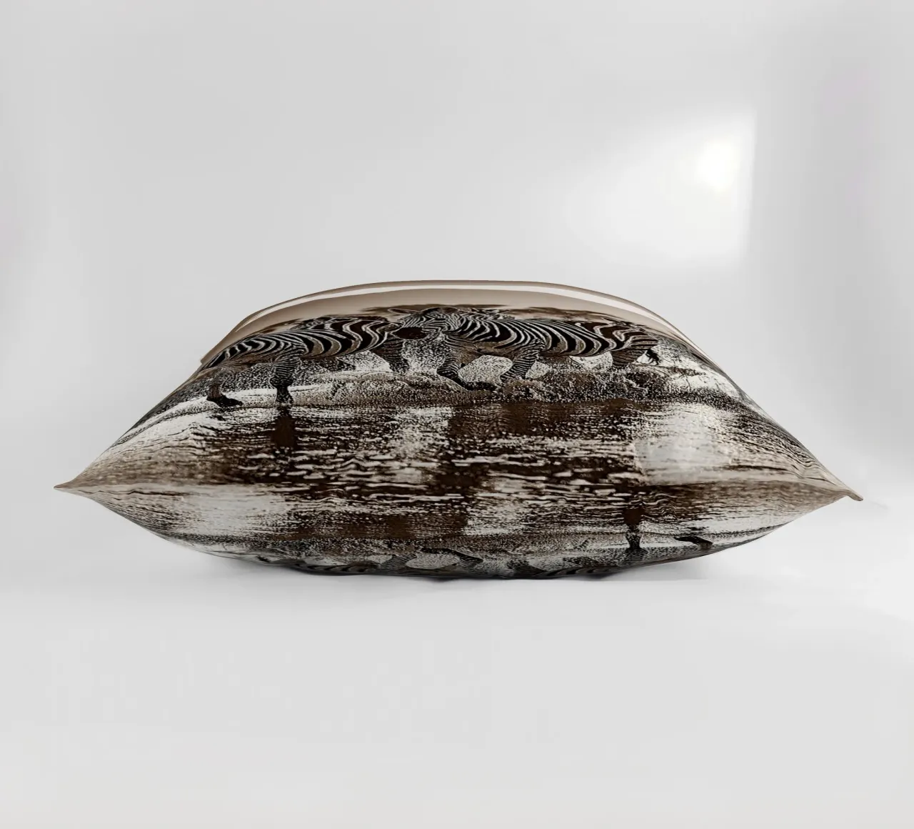 TROUPEAU DE ZEBRES. Sépia relief decorative cushion by Thierry vobmann photography