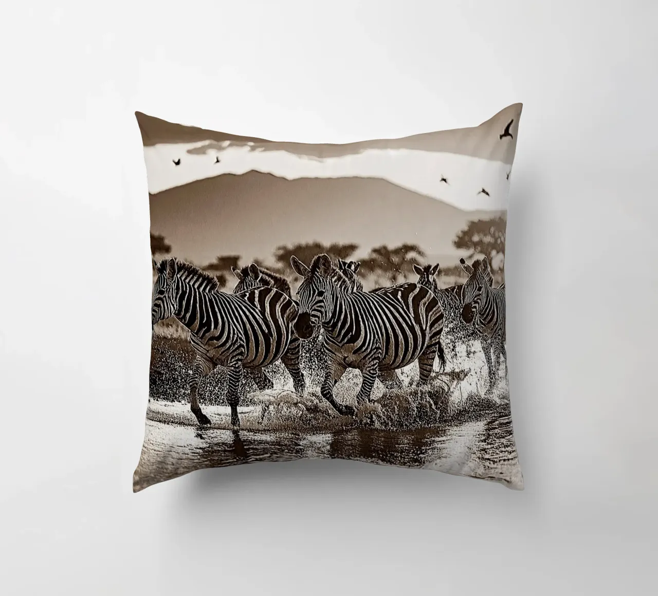 TROUPEAU DE ZEBRES. Sépia relief decorative cushion by Thierry vobmann photography