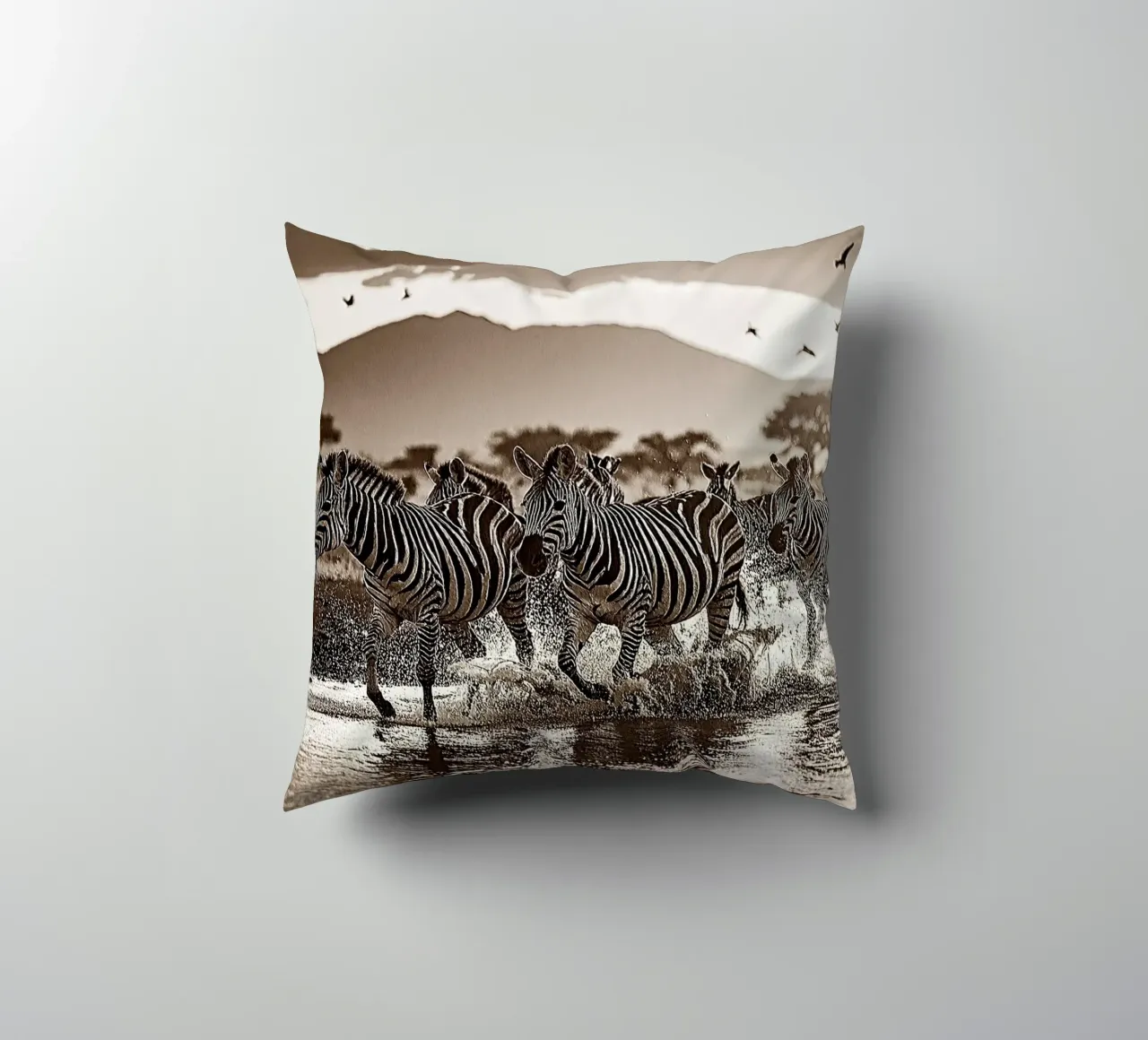 TROUPEAU DE ZEBRES. Sépia relief decorative cushion by Thierry vobmann photography