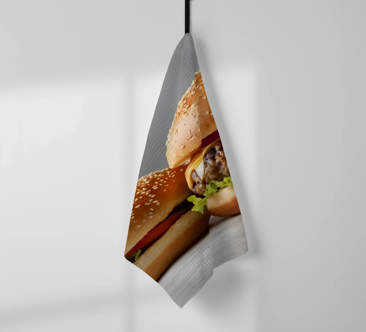 Délicieux cheeseburger et simple hamburger sur un comptoir torchon de DesignDoodle