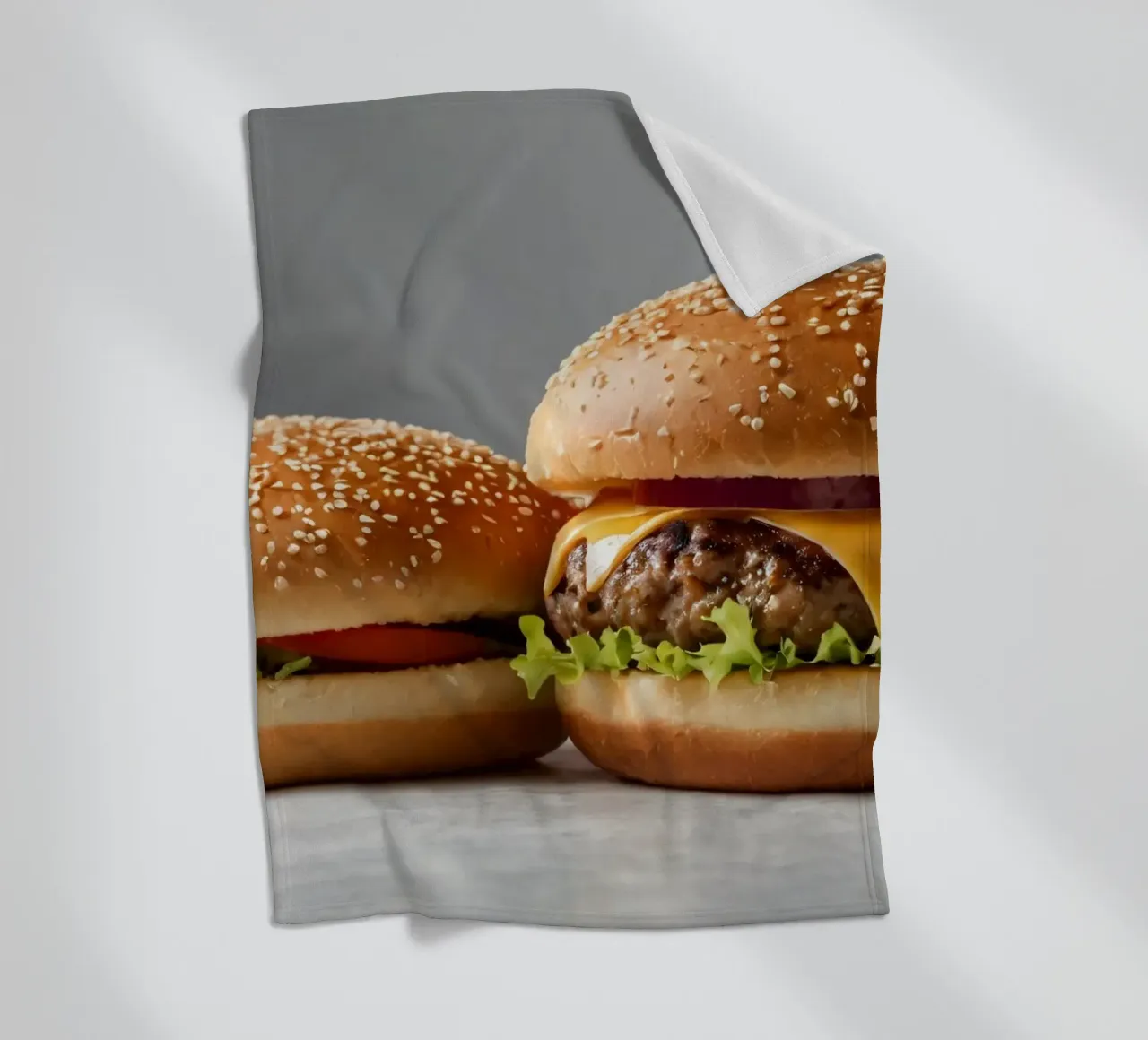Delicious cheeseburger and simple hamburger on a countertop fleece blanket by DesignDoodle