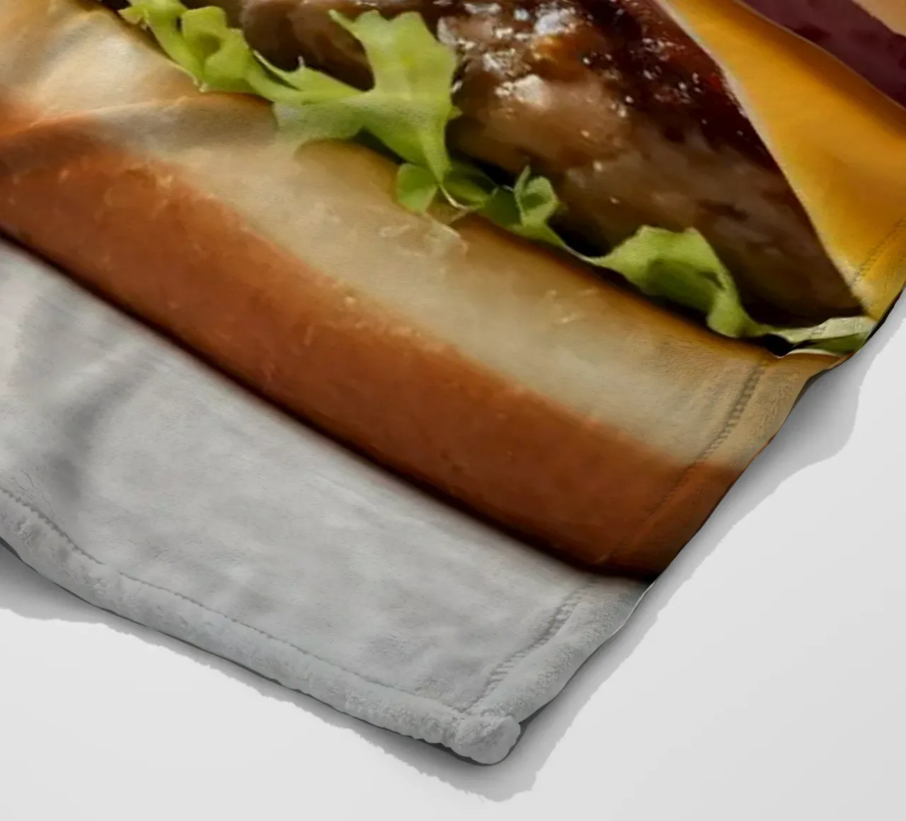 Delicious cheeseburger and simple hamburger on a countertop fleece blanket by DesignDoodle
