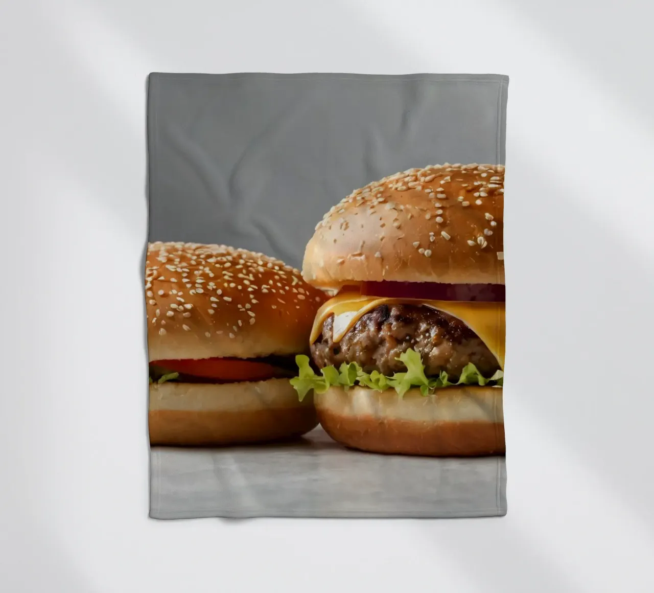 Delicious cheeseburger and simple hamburger on a countertop fleece blanket by DesignDoodle