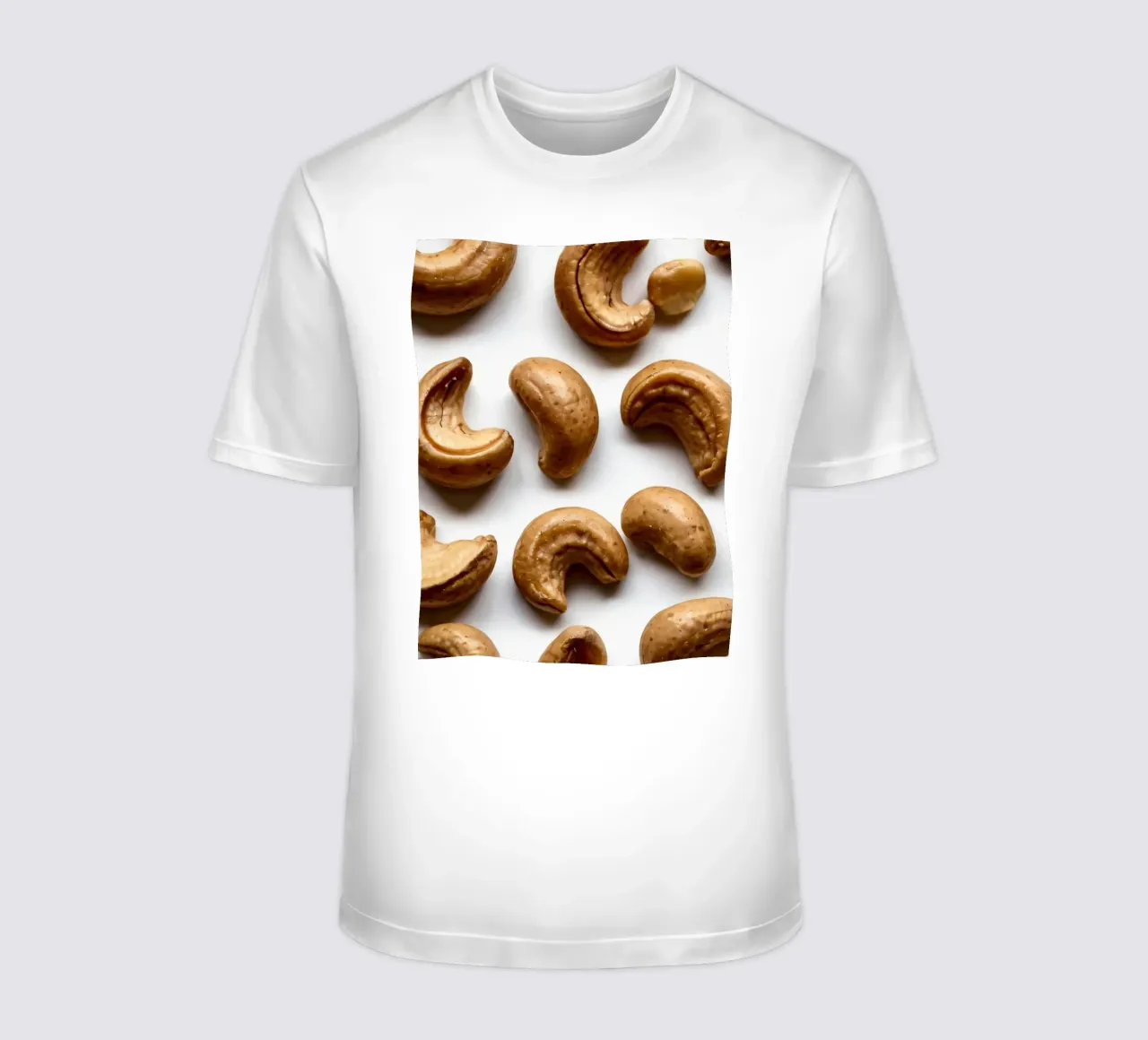 Raw cashew nuts arranged on a white surface for healthy snac t-shirt by DesignDoodle