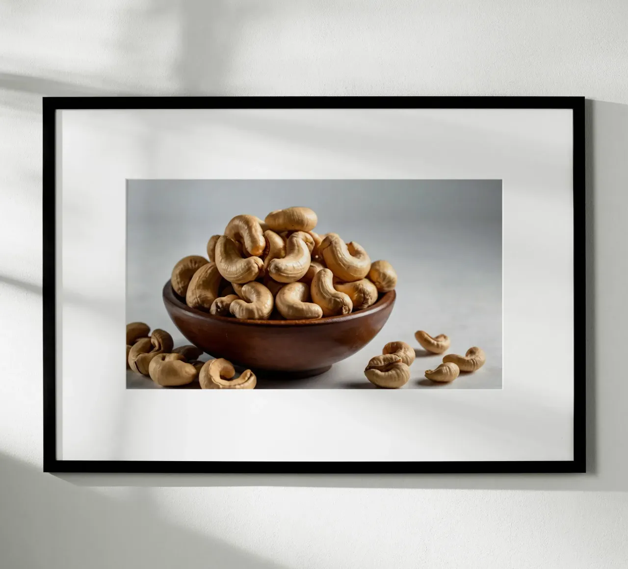 Raw cashew nuts arranged on a white surface for healthy snac hahnemühle by DesignDoodle