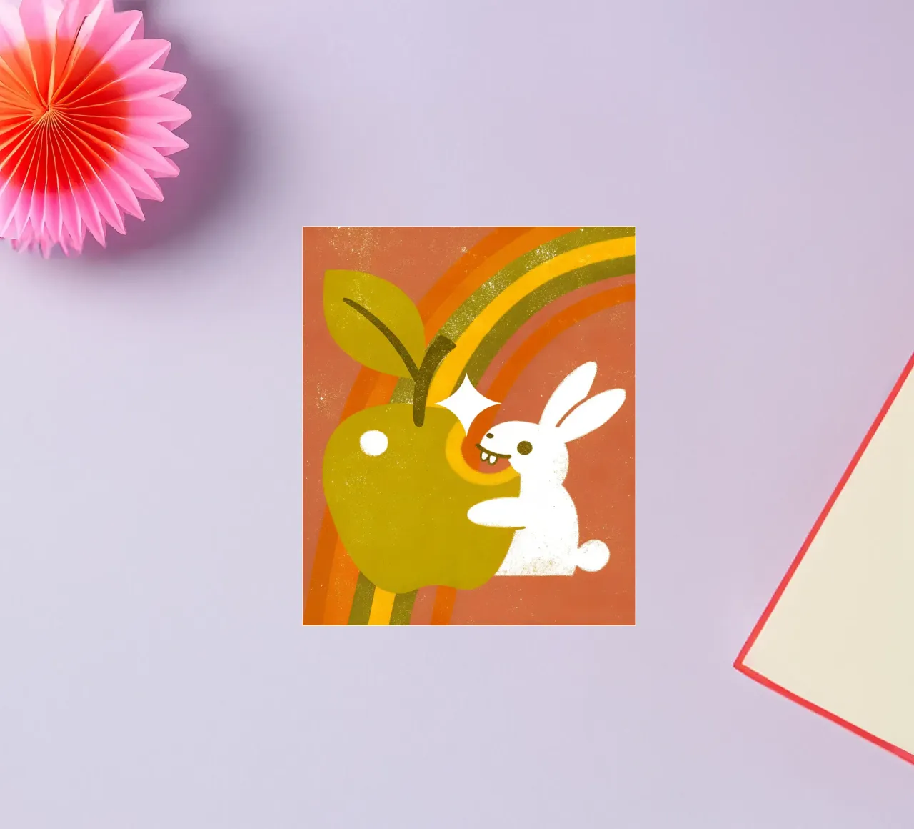 Lapin mangeant une pomme autocollant de THE LATEST SHOP