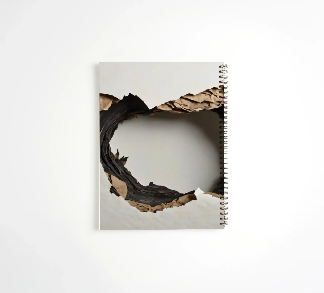 A large, irregular hole in a white wall reveals torn paper spiral notebook by DesignDoodle