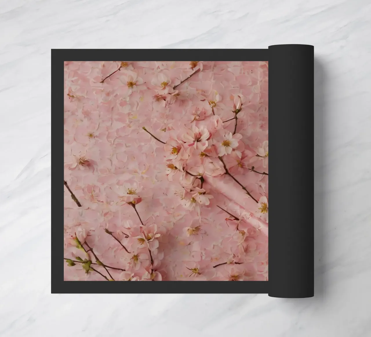 Delicati fiori di ciliegio rosa disposti su un tappeto rosa tenue zerbino da DesignDoodle