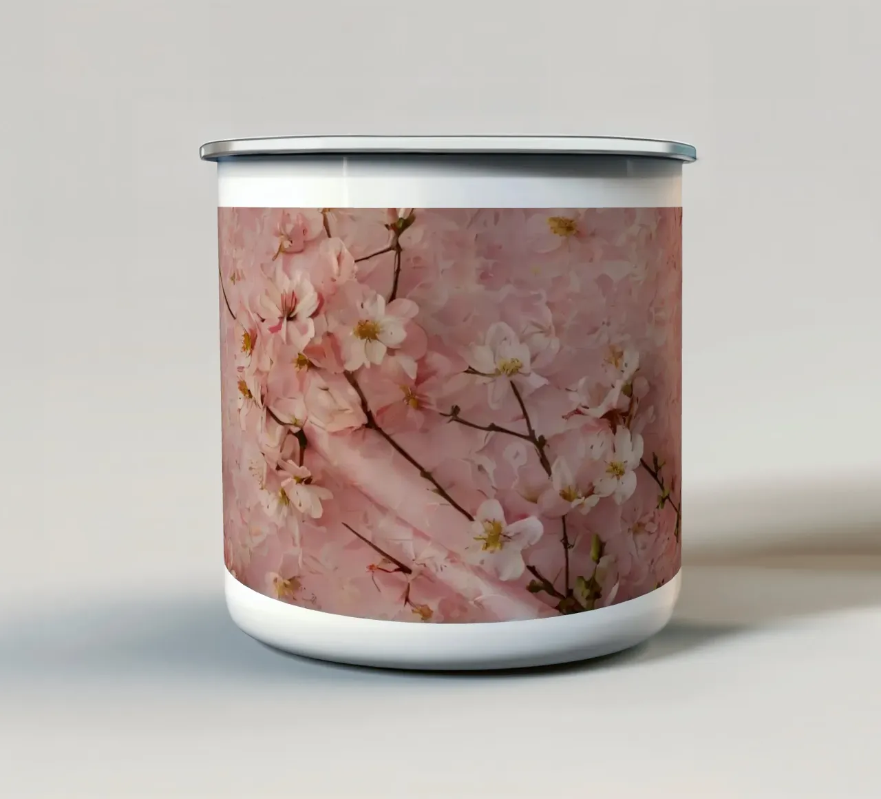 Delicati fiori di ciliegio rosa disposti su un tappeto rosa tenue tazza in smalto da DesignDoodle