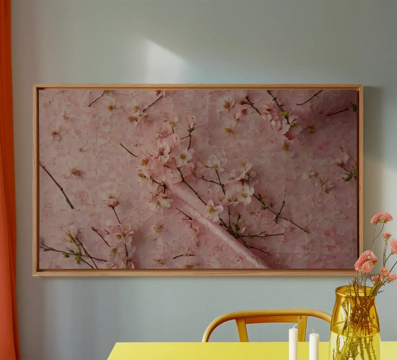 Delicati fiori di ciliegio rosa disposti su un tappeto rosa tenue tela con Cornice a cassetta da DesignDoodle