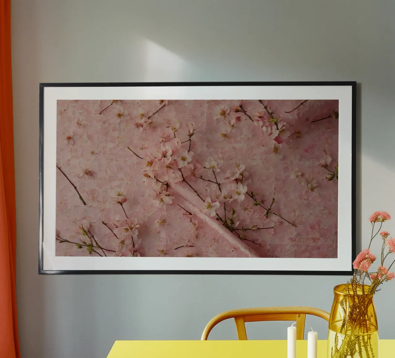 Delicati fiori di ciliegio rosa disposti su un tappeto rosa tenue poster da DesignDoodle