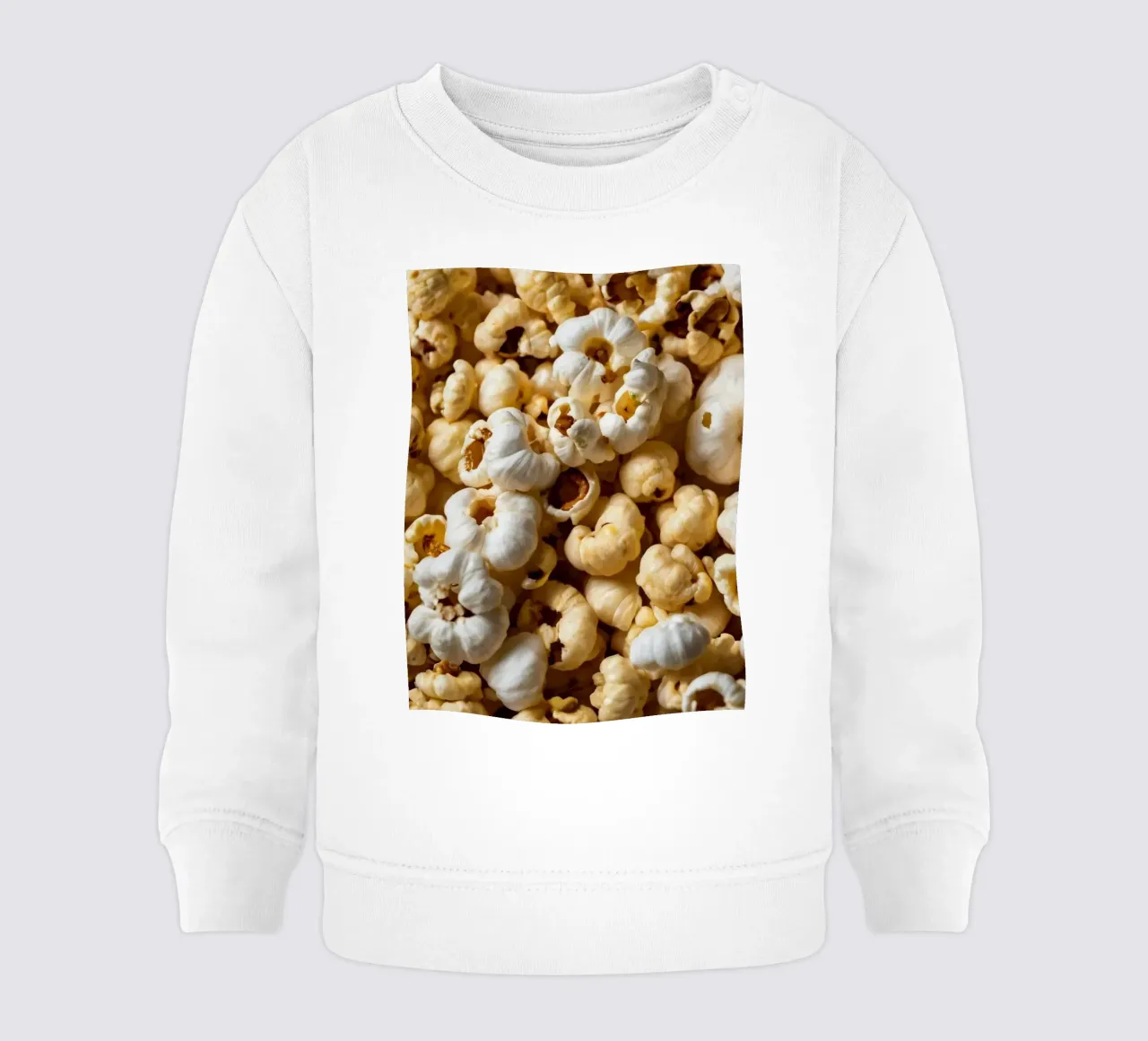 Popcorn appena sfornati in una vista ravvicinata felpa neonato da DesignDoodle