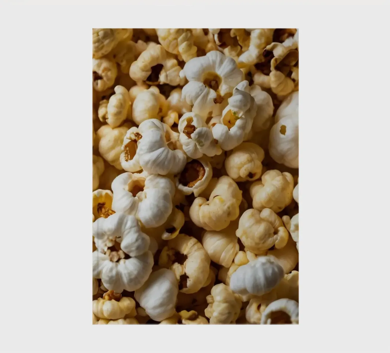 Freshly popped popcorn in a close-up view notebook by DesignDoodle