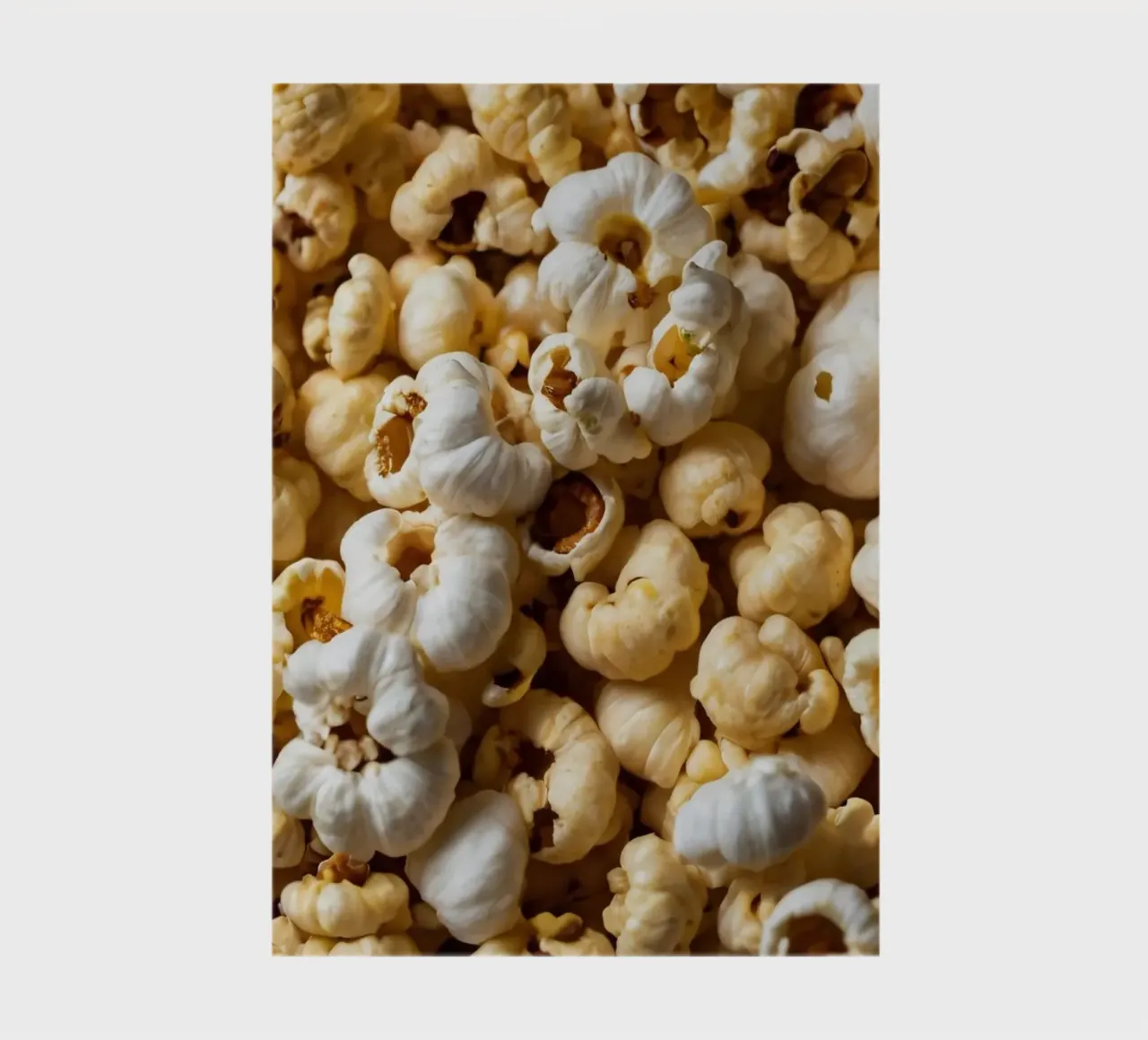 Freshly popped popcorn in a close-up view notebook by DesignDoodle