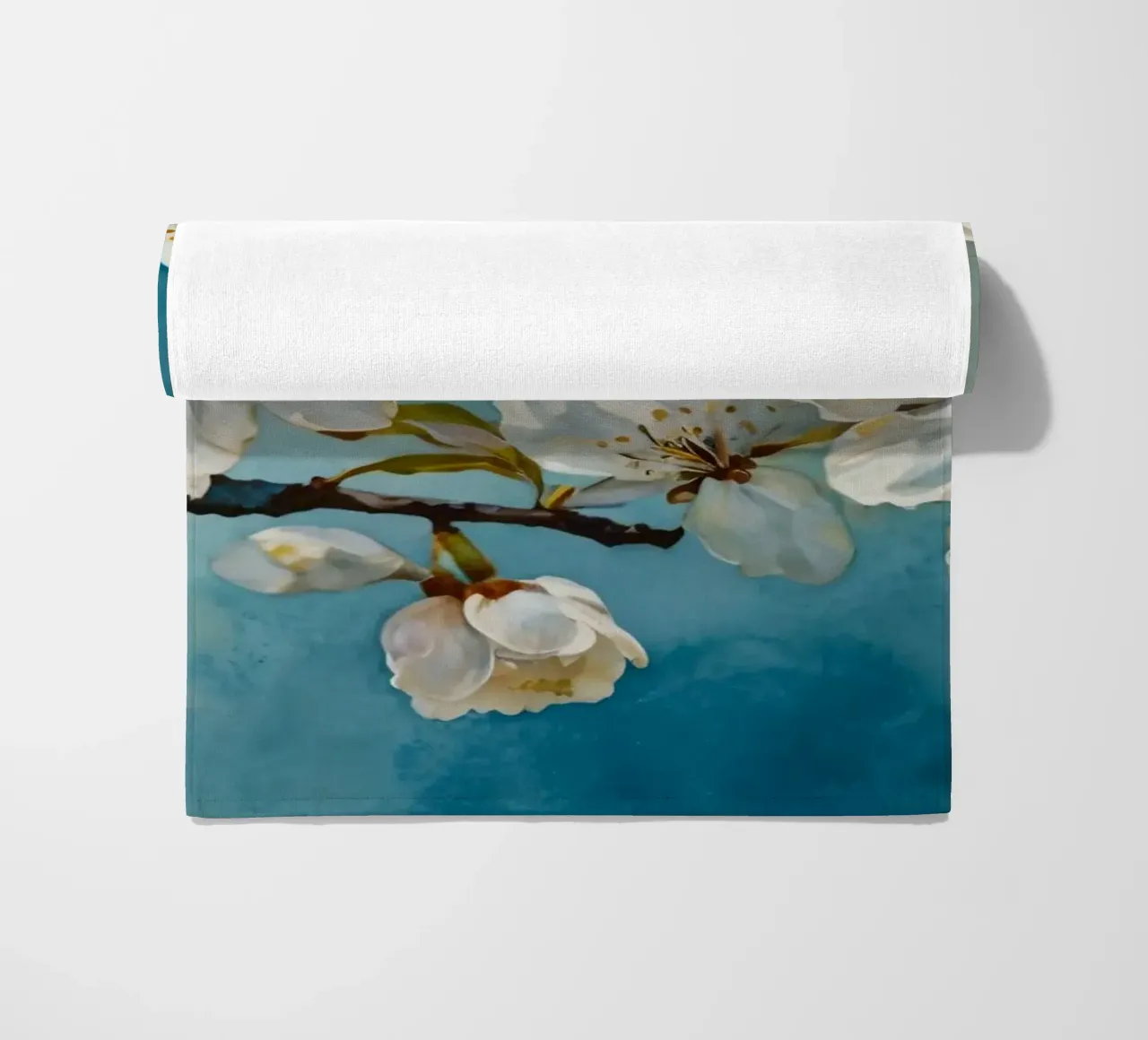 Blossoming cherry tree branch adorned with delicate white beach towel by DesignDoodle