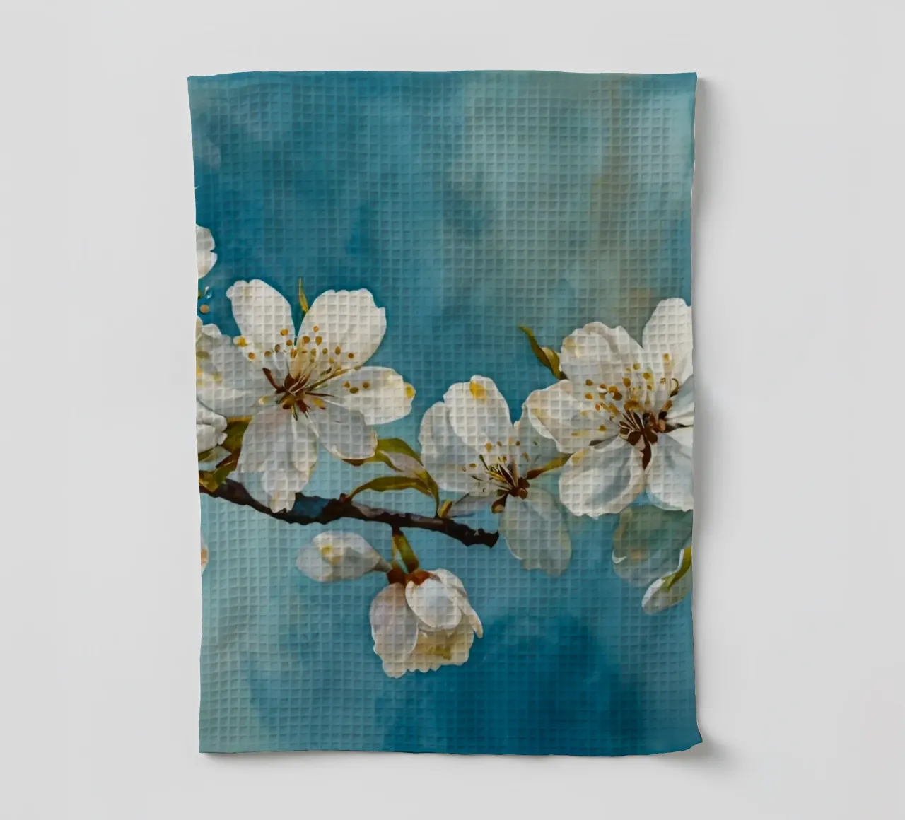 Branche de cerisier en fleurs ornée de délicates fleurs blanches. torchon de DesignDoodle