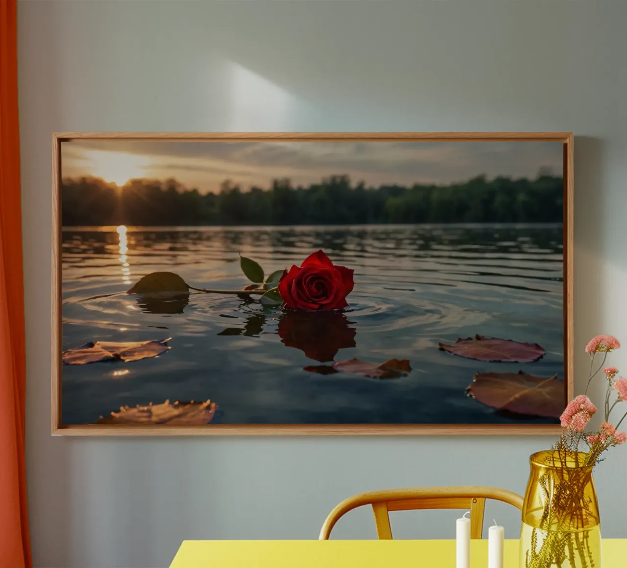 A single red rose floats gracefully on calm water at sunset canvas with Floater frame by DesignDoodle