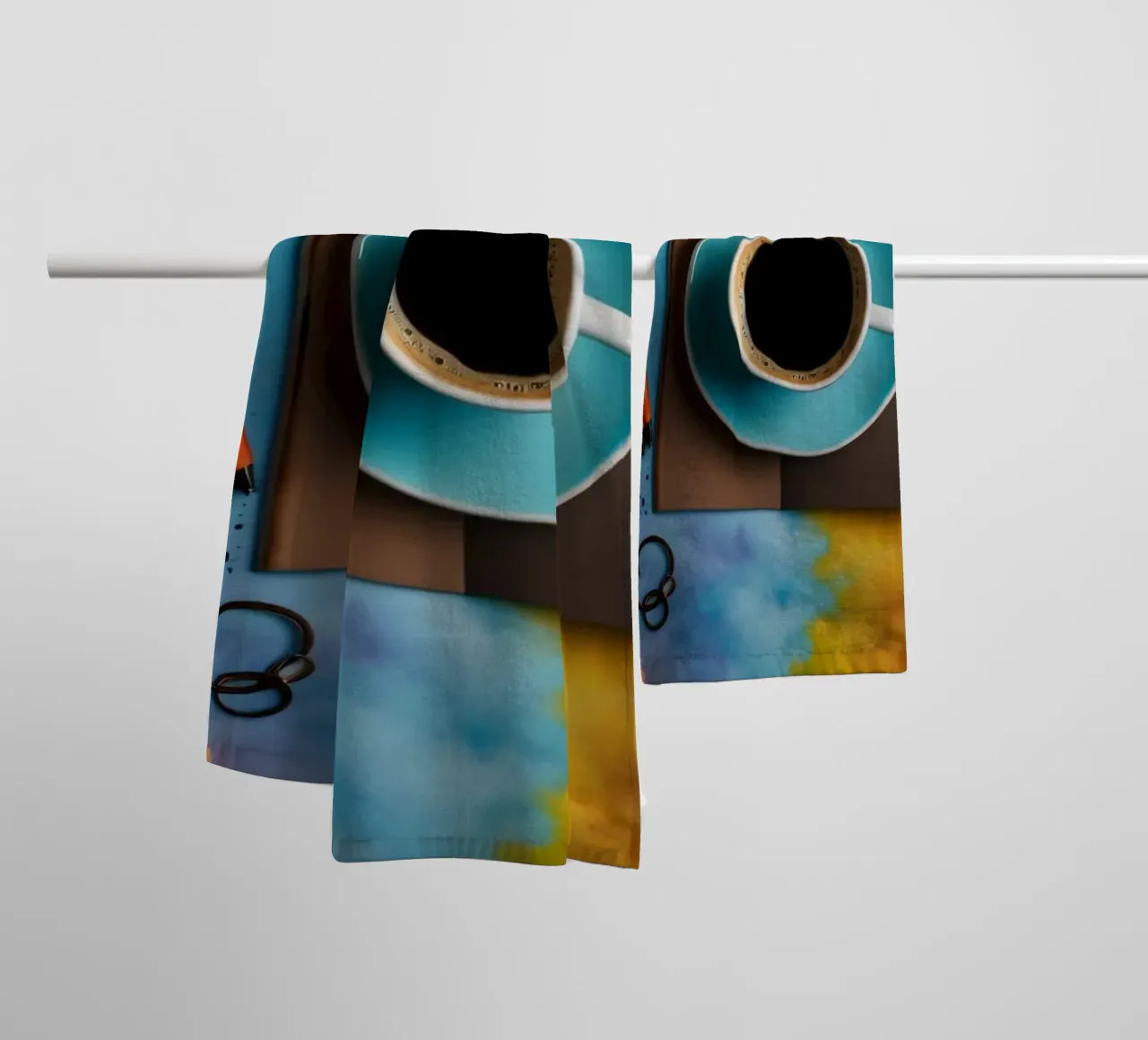espacio de trabajo con una taza de café azul sobre un colorido arte toalla de baño de DesignDoodle