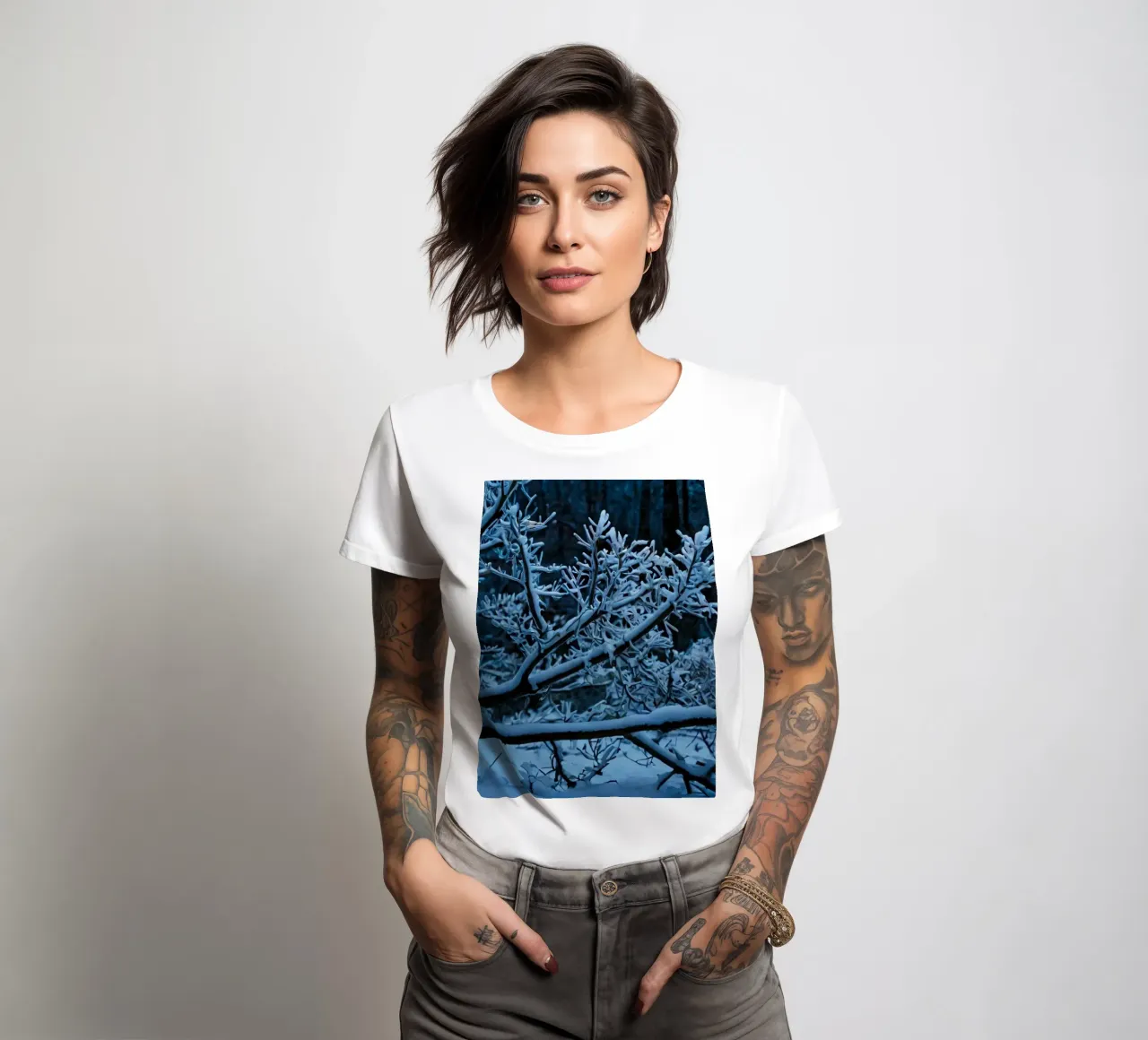 Snow-covered branches create a calm winter landscape women's fitted t-shirt by DesignDoodle