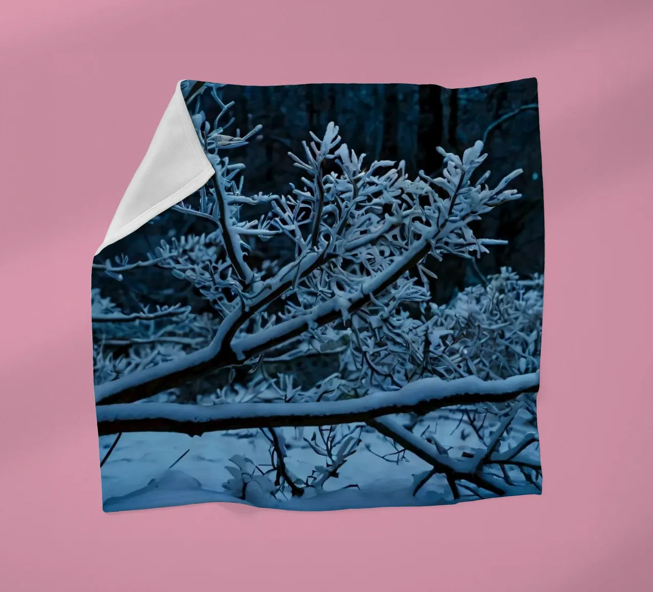 Snow-covered branches create a calm winter landscape fleece blanket by DesignDoodle