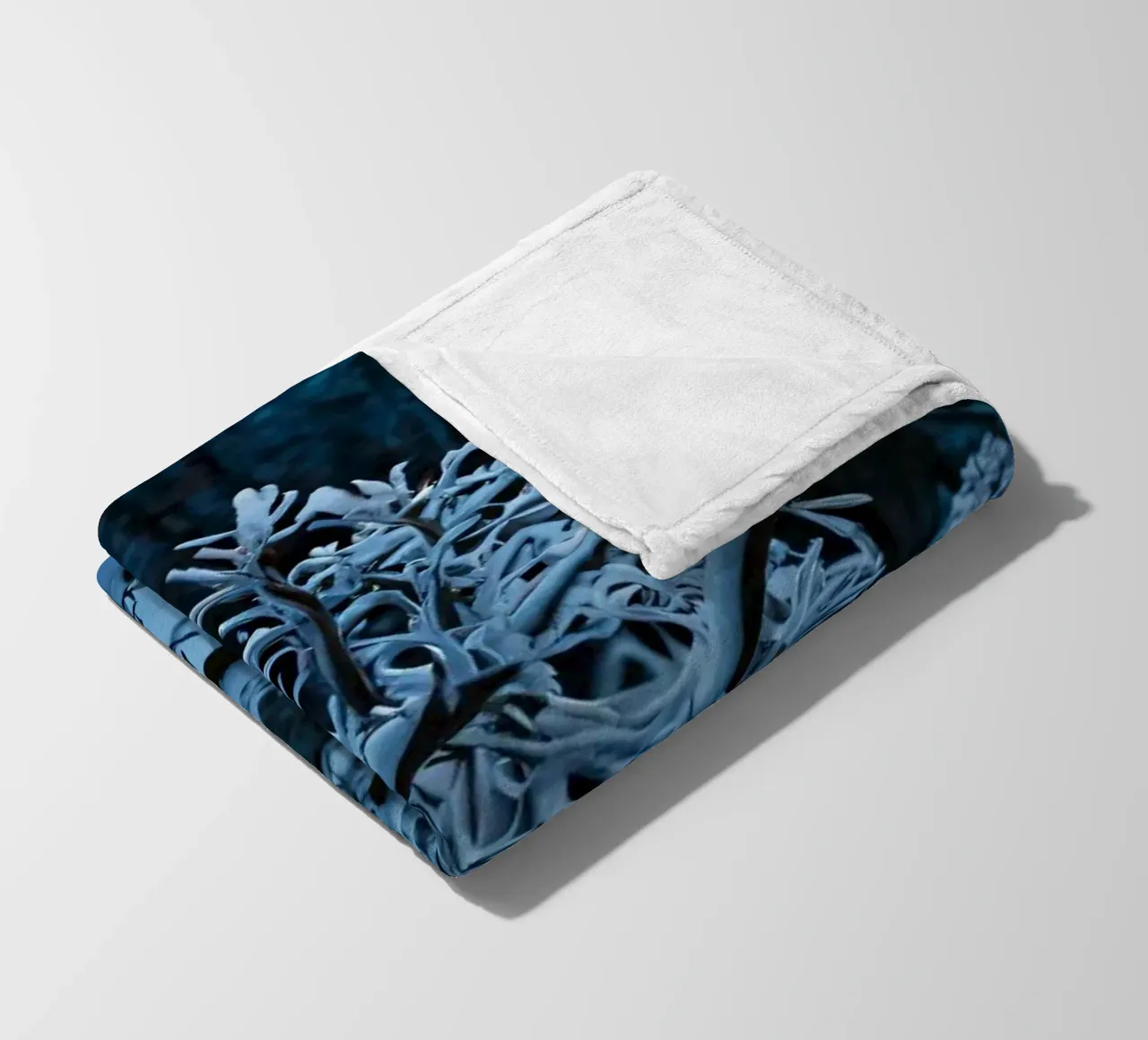 Snow-covered branches create a calm winter landscape fleece blanket by DesignDoodle