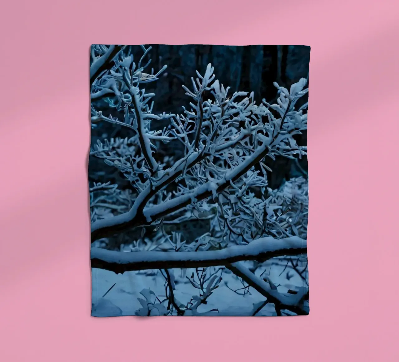 Snow-covered branches create a calm winter landscape fleece blanket by DesignDoodle