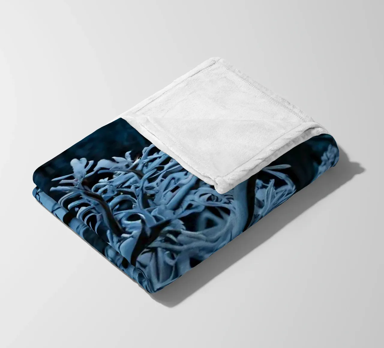 Snow-covered branches create a calm winter landscape fleece blanket by DesignDoodle