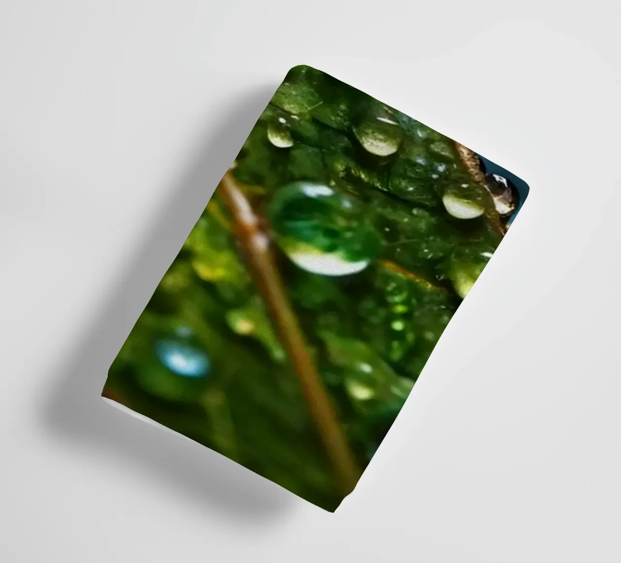 leaves glistening with raindrops after a refreshing rain towel by DesignDoodle