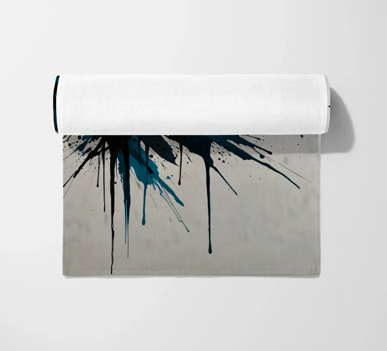 Abstract explosion of teal and black paint on a white canvas beach towel by DesignDoodle