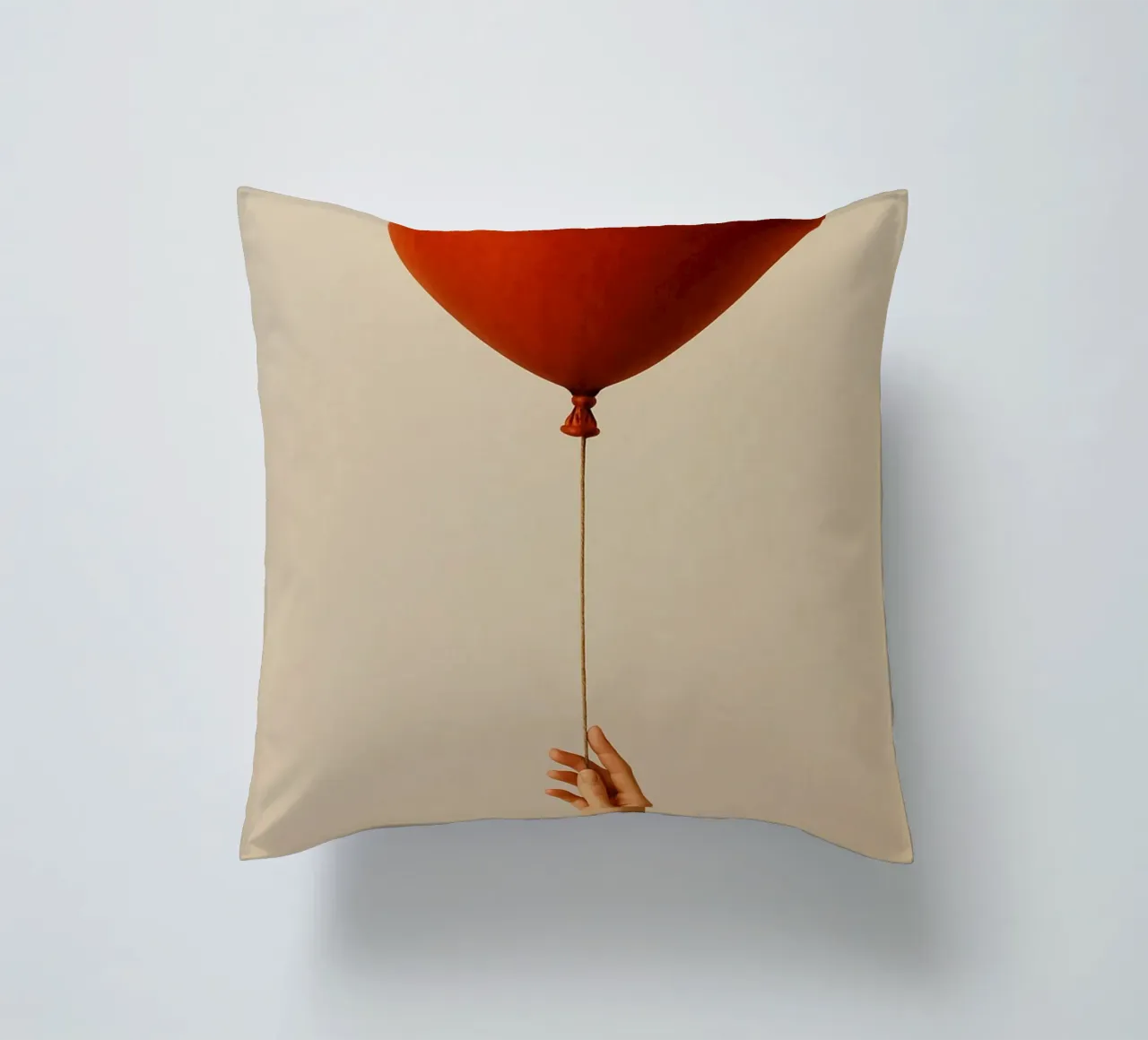 Held by a String: A Terracotta Heart Balloon cuscino da Mosaic Dialogue