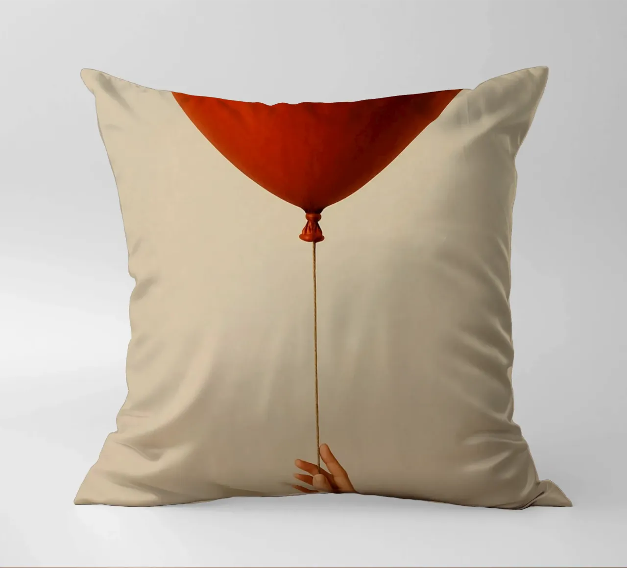 Held by a String: A Terracotta Heart Balloon cuscino da Mosaic Dialogue