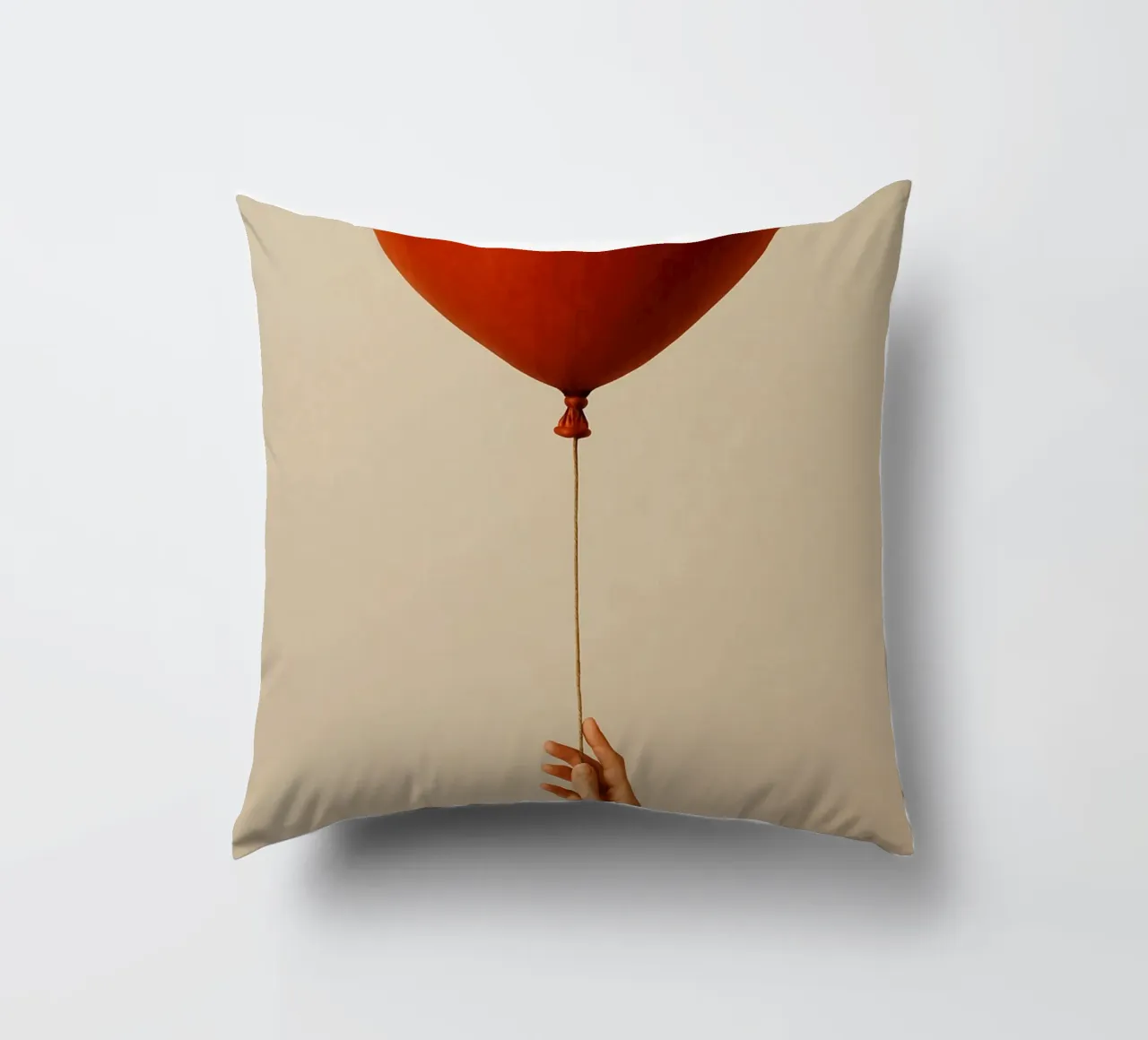 Held by a String: A Terracotta Heart Balloon cuscino da Mosaic Dialogue