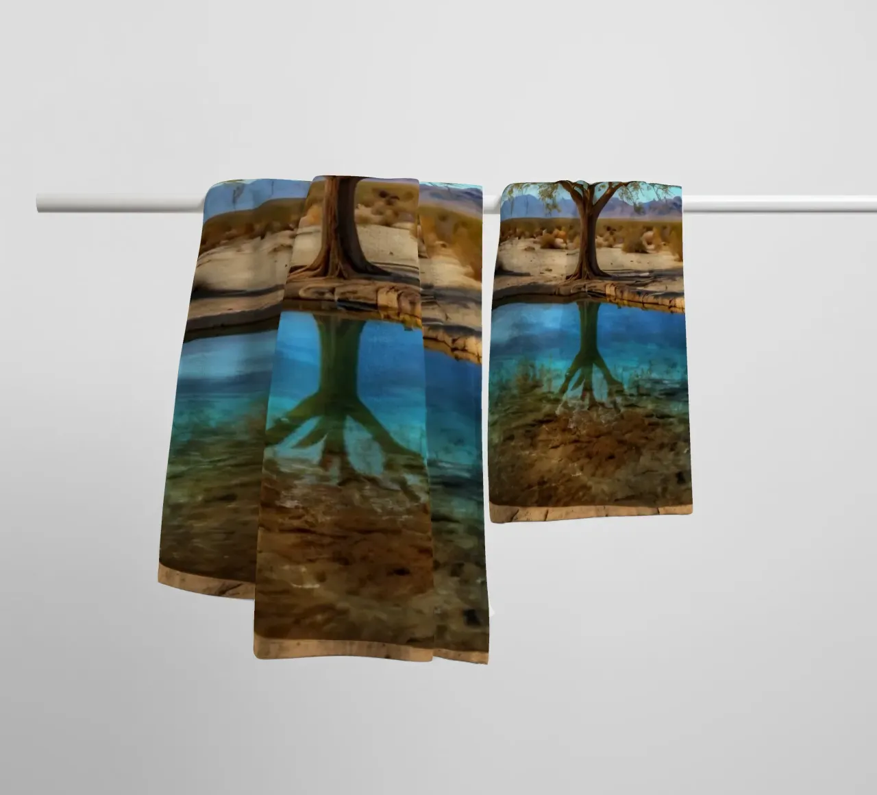 Un'oasi di pace nel deserto con un albero vivace che si riflette in un'atmosfera limpida. asciugamano da bagno da DesignDoodle