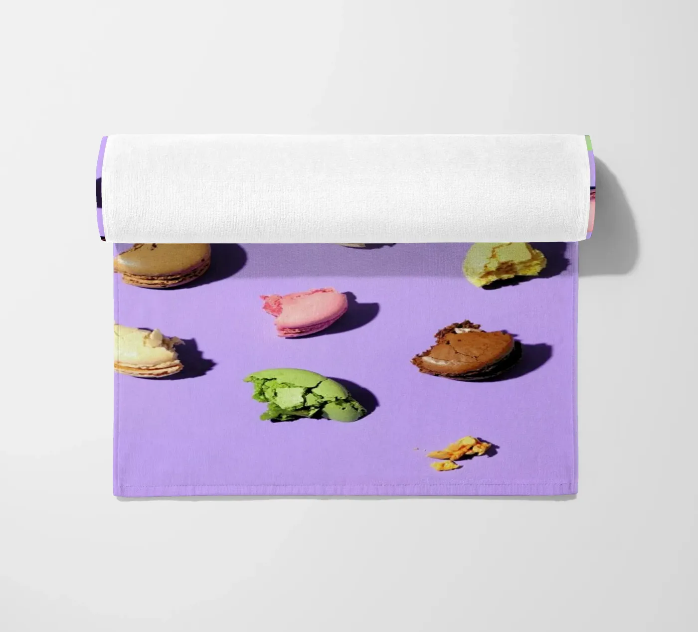 Macroons beach towel by Kyla Elaine