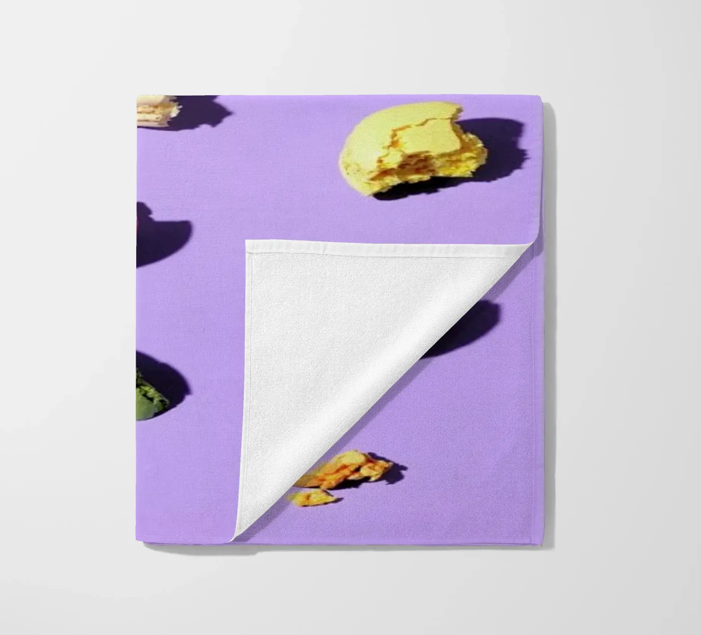 Macroons beach towel by Kyla Elaine