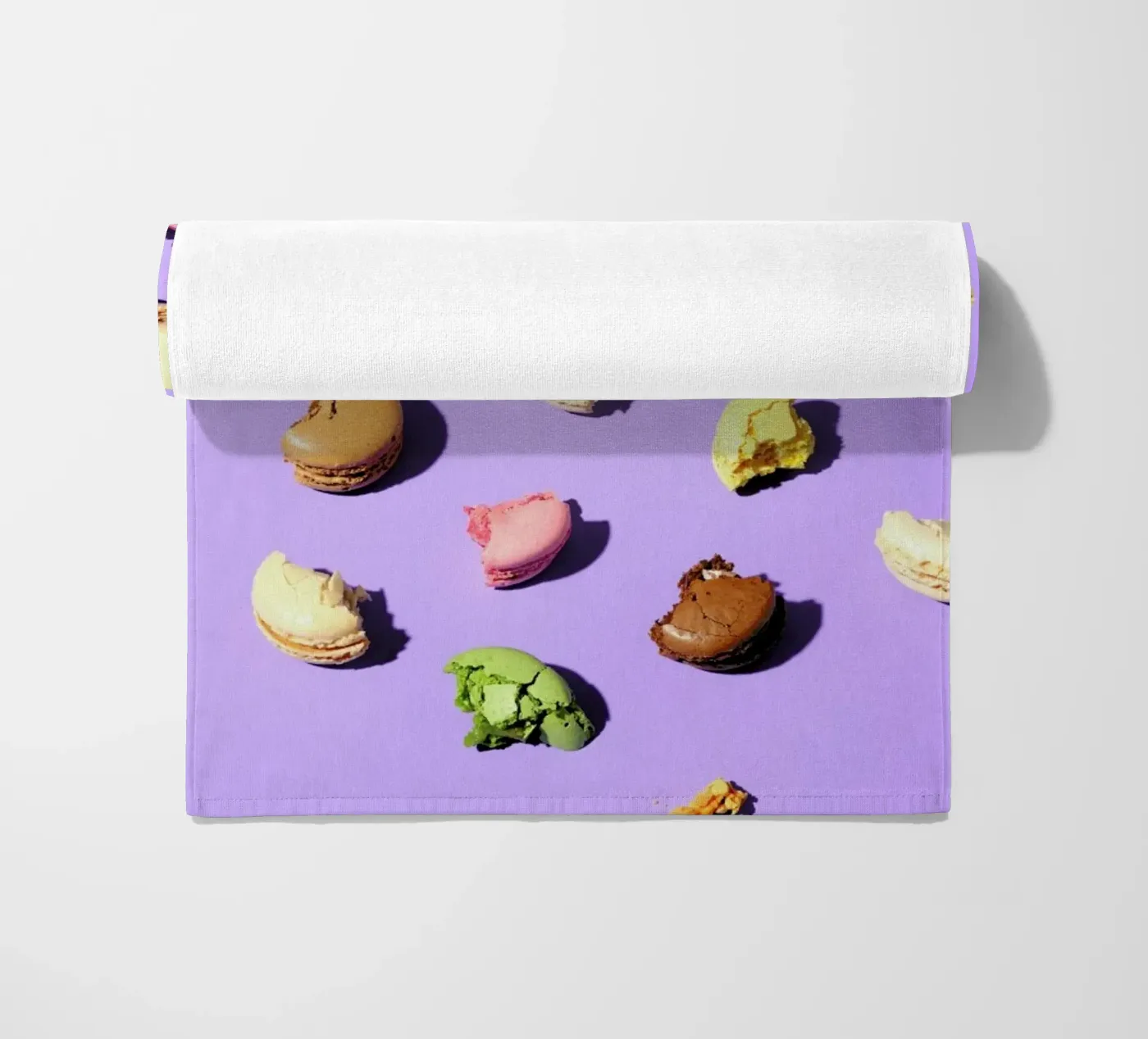 Macroons beach towel by Kyla Elaine