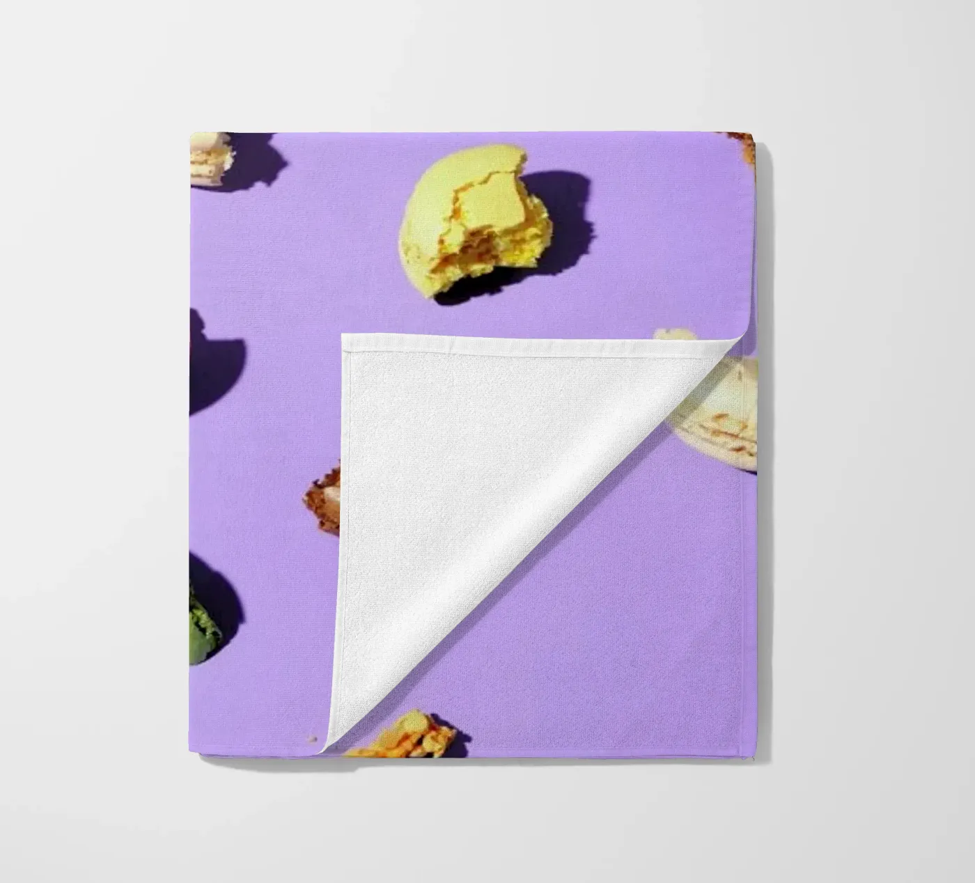 Macroons beach towel by Kyla Elaine