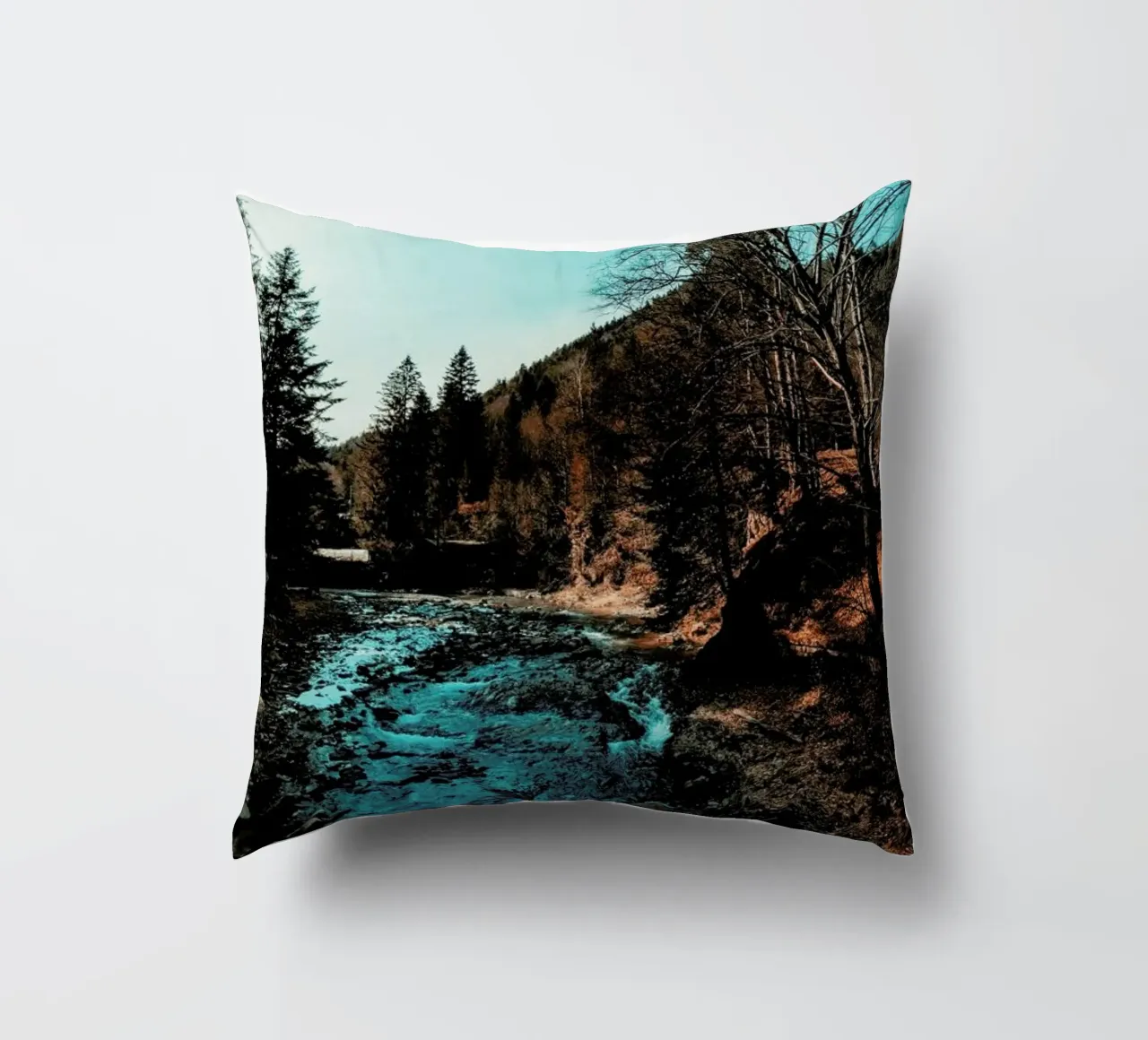 Idyllic River Through The Woods decorative cushion by Sebastian Hilgetag